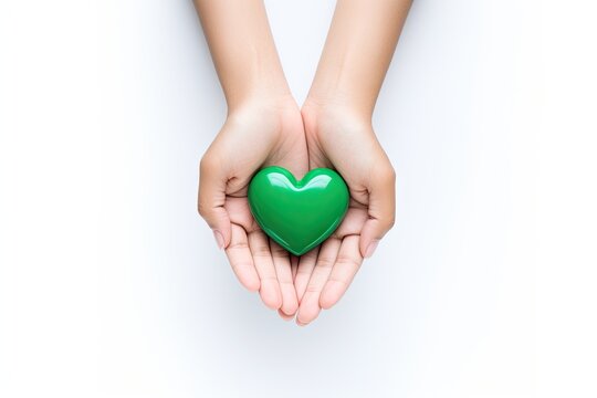 hands holding beautiful green heart hospital white cross symbol it showing concept health care service cancer treatment surgery banner top view isolated background nubes hand support medication