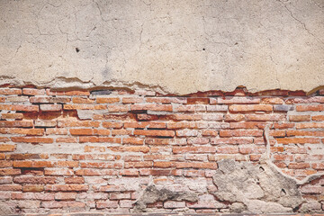 Old  red brick wall texture with decay and cracked concrete abstract on background