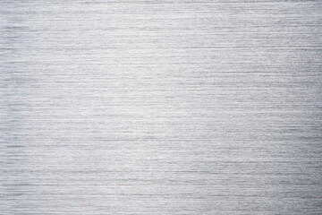 Fototapeta premium Brushed metal stainless steel texture background with reflection light