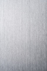 Brushed metal stainless steel texture background with reflection light