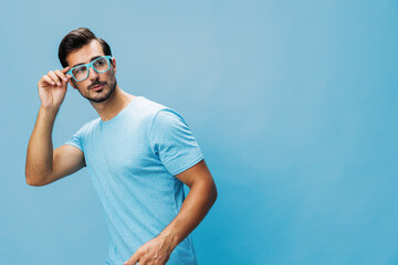 Beard man portrait lifestyle t-shirt style fashion blue background smile trendy glasses modern...