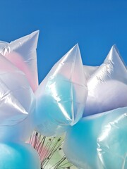 Colorful sugar cotton candy and blue sky - Street food
