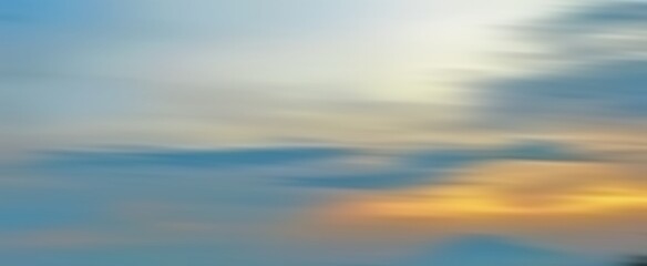 blurred background of sunset and blue sky
