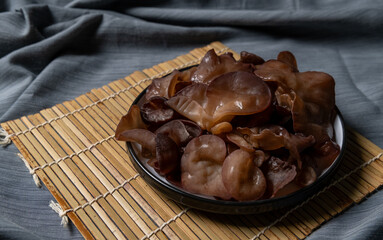 wood ear mushroom in black plate