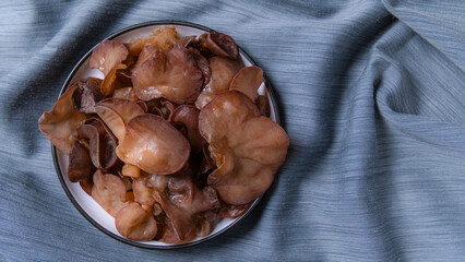wood ear mushroom in black plate above view