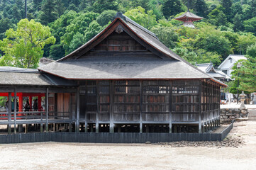 Fototapeta na wymiar Miyajima temple detail of old wooden side in Itsukushima, Japan