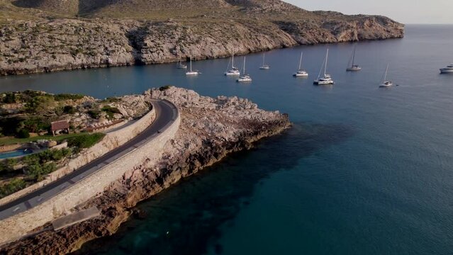 4k drone. Cala Sant Vicenç is a small resort town in north-eastern Mallorca, Spain. It consists of three small beaches, hotels, and villas with spectacular views.