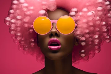 Fototapeten Fashion, make-up, style concept. Beautiful afro woman with soap bubbles and sunglasses minimalist close-up studio portrait. Vivid colors, pop-art style © Rytis
