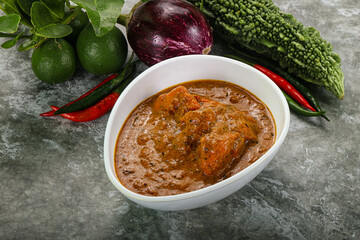 Indian cuisine - chicken curry with spices