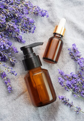 Fototapeta na wymiar Lavender spa. Lavender natural essential oil and fresh lavender