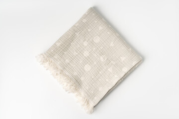 Gray muslin blanket for kids on white background