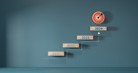 Planning and challenge strategy in new year 2024 Concept. wooden Target objectives with business...