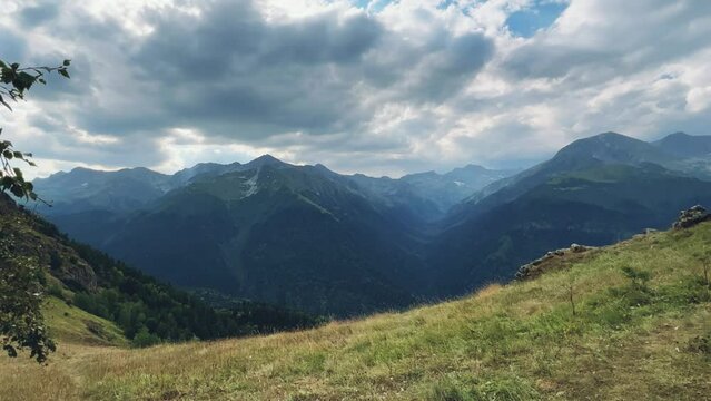 View of the mountain range near Mount Zakan. The top of the mountain node of the western part of the main ridge of the Greater Caucasus. Zakan Peak is the beginning of the Magisho mountain range. 4К
