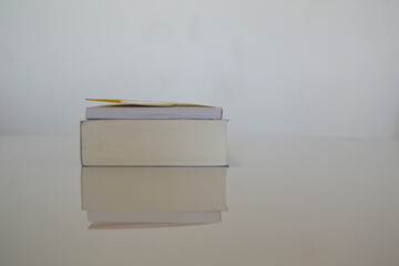 a book on a table with a white background