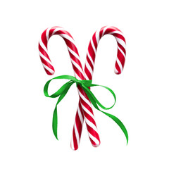 Candy canes with green Ribbon isolated on a white background - 670376368