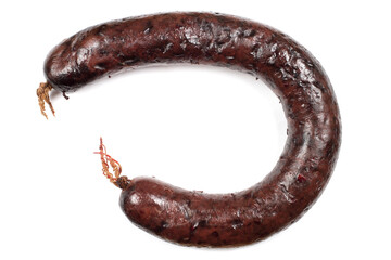 Homemade black pudding on a white background. Natural sausage close-up.