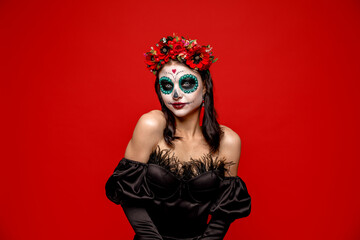 young lady portrait of sugar skull, Calaveras makeup on red background