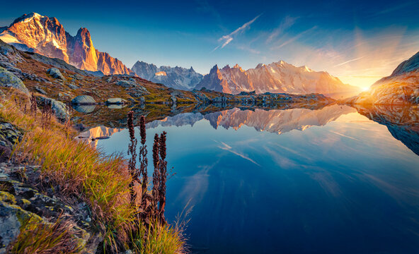 Superb autumn sunrise on Cheserys lake with Mount Blank on background. Spectacular outdoor scene of Vallon de Berard Nature Preserve, Chamonix location, Alps, France, Europe.