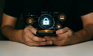 Cyber security concept, man hand protection network with lock icon and virtual screens on smartphone.