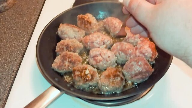 Swedish Meatballs Frying Process. Pork Meat, Garlic and Spices Food Recipe