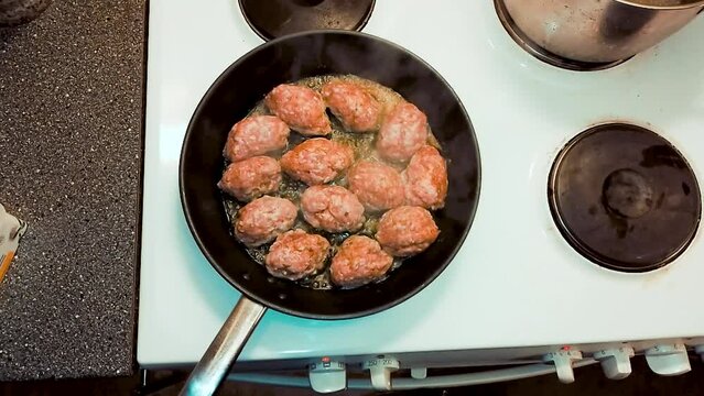 Top View of Swedish Meatballs in Butter on Frying Pan. Food Recipe Pork Meat
