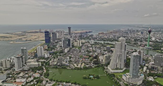 Colombo Sri Lanka Aerial v16 flyover Gangaramaya park capturing downtown cityscape across area 03 and 02 featuring high rise buildings and economic port city - Shot with Mavic 3 Cine - April 2023