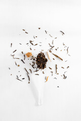 dried tea leaves, tea variety on white background