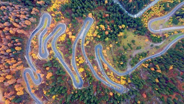 4k drone flight down footage (Ultra High Definition) of Maloya pass. Extraordinary morning scene in Swiss Alps, Upper Engadine in canton of the Grisons, Switzerland. Traveling concept background.