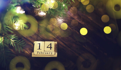 Wood cubes with 14 February date calendar. concept of Saint Valentine's.