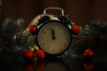 Obraz na płótnie Canvas New Year's clock. Decorated with gift box and decorations background. Celebration Concept for New Year Eve.