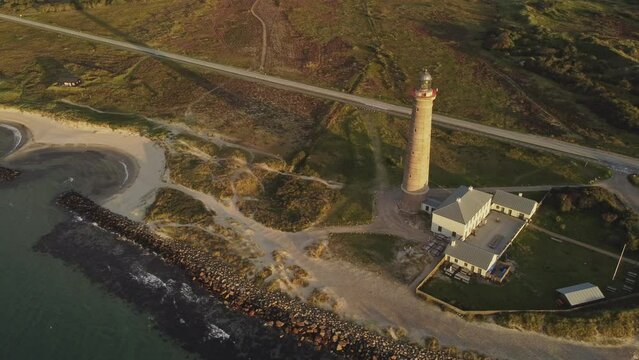 Gray Lighthouse In Skagen Near Grenen Beach Natural Park, Denmark. Aerial Shot
