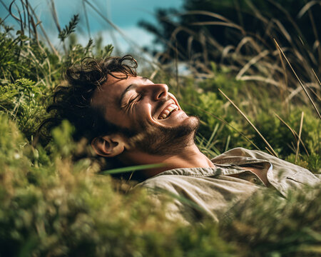 Happy man smiling and laying on the meadow with his eyes closed. surrounded by grass and miscanthus. Created with Generative AI technology