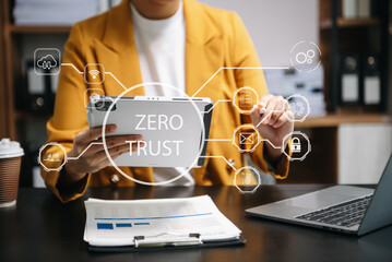 Zero trust security concept Person using computer and tablet with zero trust icon on virtual screen...