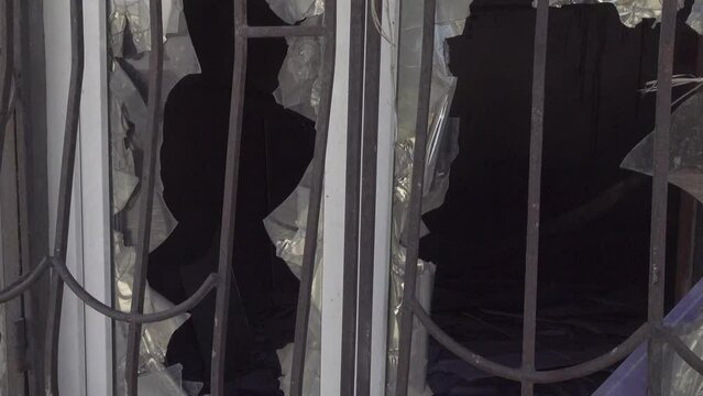 Broken window in a residential area in city