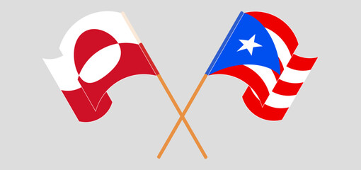 Crossed and waving flags of Greenland and Puerto Rico