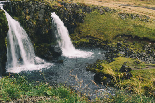 Beautifull arrowhead mountain Kirkjufell and waterfall on Snaefellsnes peninsula, Iceland