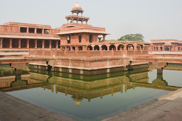 Fototapeta premium Abdar Khana building and Anoop Talao water basin, Fatehpur Sikri, Uttar Pradesh, India, UNESCO World Heritage Site