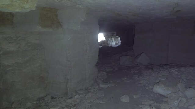 Limestone quarry (stone sawing), which is 200 years old. Underground halls, piles of sawn stones, zigzag corridors, dead ends, niches. Object for spelunking