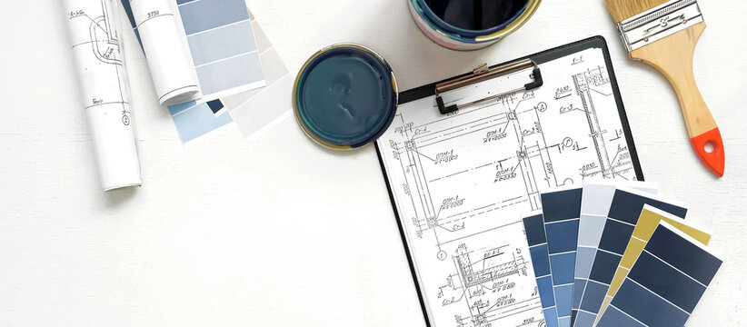 Architect works remotely from home Remote work, stay home, new normality, social distance. Architect design working drawing sketch plans blueprints