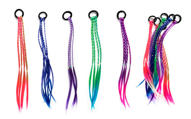 Colored braids, hair accessory on an elastic band on a white background close-up