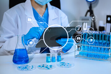 Scientist mixing chemical liquids in the chemistry lab. Researcher working in the chemical laboratory with virtual icon..