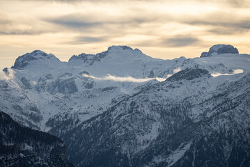 Civetta resort. Panoramic view of the Dolomites mountains in winter, Italy. Ski resort in Dolomites, Italy. Aerial  drone view of ski slopes and mountains in dolomites.