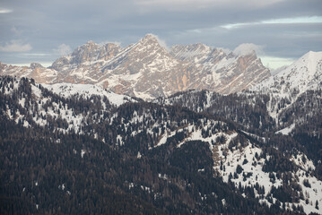 Civetta resort. Panoramic view of the Dolomites mountains in winter, Italy. Ski resort in Dolomites, Italy. Aerial  drone view of ski slopes and mountains in dolomites.