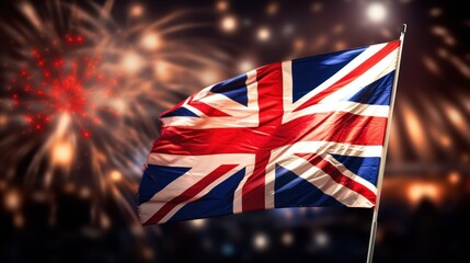Obraz premium Guy Fawkes Night Bonfire festive background with United Kingdom flag blowing in the wind at Fireworks background. UK Guy Fawkes Night, Bonfire Night and Fireworks Night background