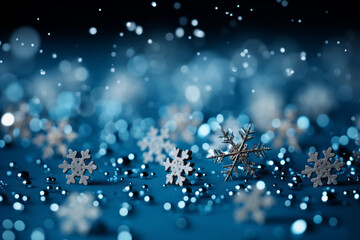 Scattered snowflakes on a blue background, winter banner with space for text