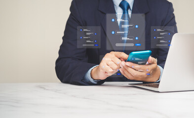 Businessman typing on a smartphone with live chat chatting on an application communication digital media