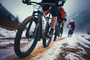 Fototapeta na wymiar Mountain bikers in winter close up. Extreme sport