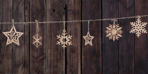 wooden Christmas docorations on dark background