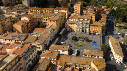 Aerial view of Piazza IV Novembre located in the center of Bracciano, in the metropolitan city of Rome, Italy. It is one of the most important squares in the town.