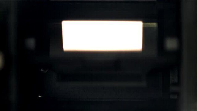 Operation of camera matrix shutters. Macro shot. Filmed on a high-speed camera at 1000 fps. High quality FullHD footage